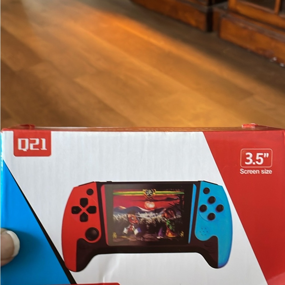 Q2 Dual-Tone Handheld Console